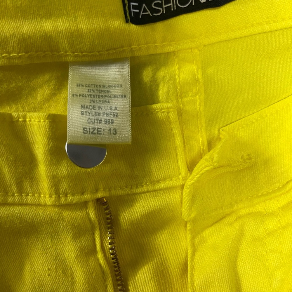 Yellow ripped bell bottoms. Super flattering on!